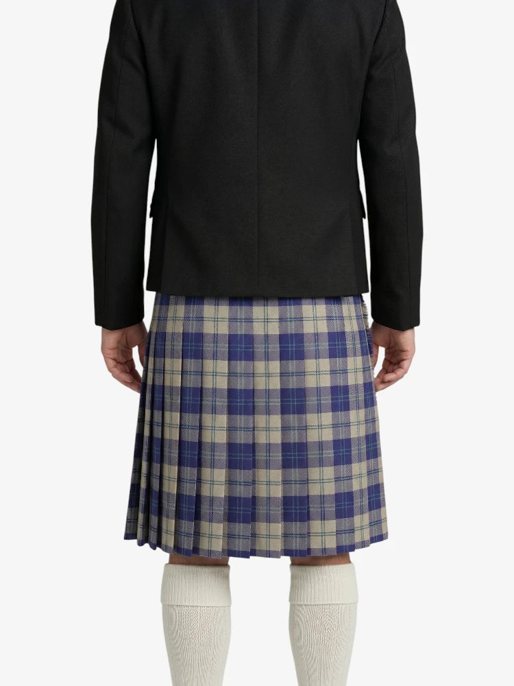 Person wearing a black jacket and blue plaid kilt on a white background