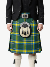 Person wearing a green and yellow plaid kilt with a tartan sporran on a white background