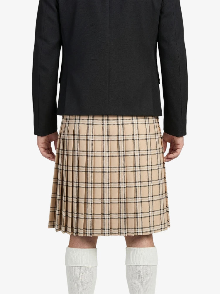 Person wearing a black coat and beige plaid kilt on a white background