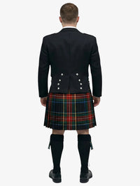 Person wearing a black prince charlie jacket and tartan black stewart tartan kilt on a white background