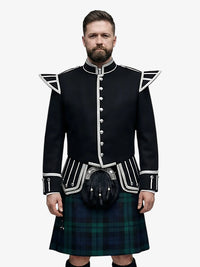 Man wearing a black highland doublet dress with white trim