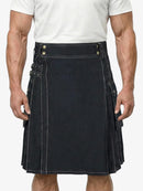 Man wearing a black kilt on a white background