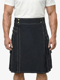 Man wearing a black kilt on a white background