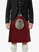 Person wearing a black jacket, red plaid kilt, and white socks on a white background