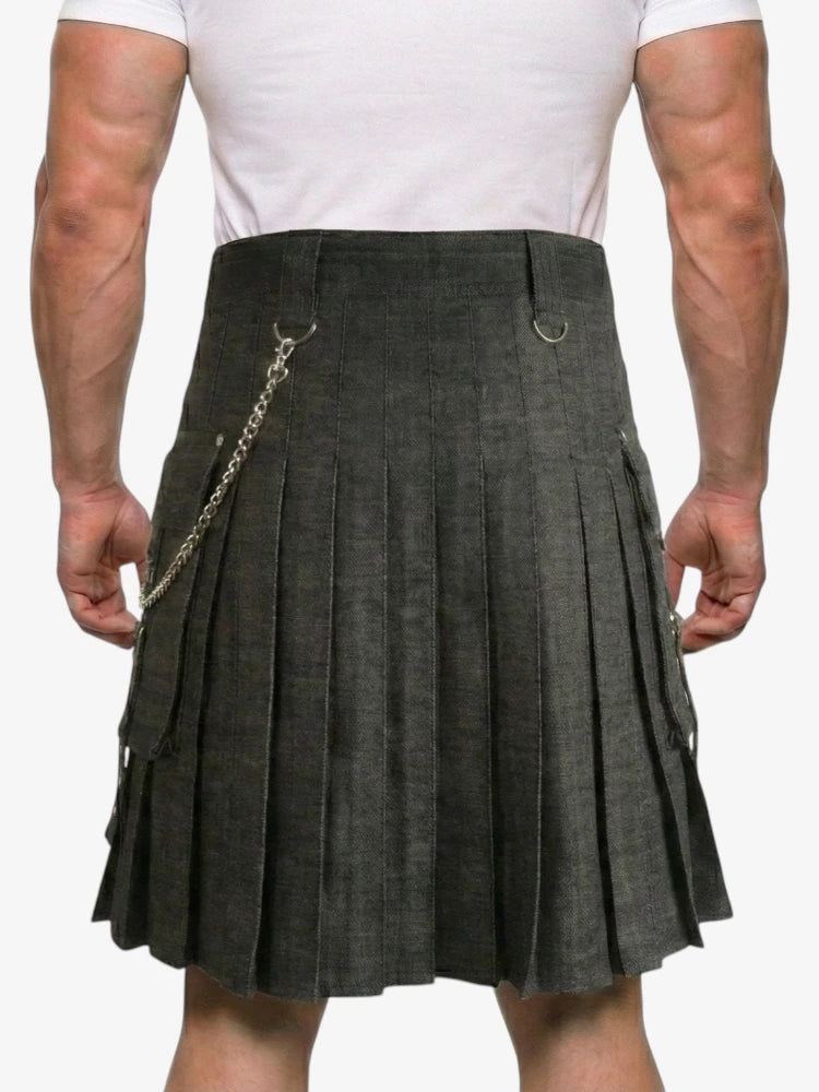 Person wearing a gray kilt with a chain detail on a white background