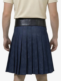 Person wearing a navy pleated skirt with a black waistband on a white background