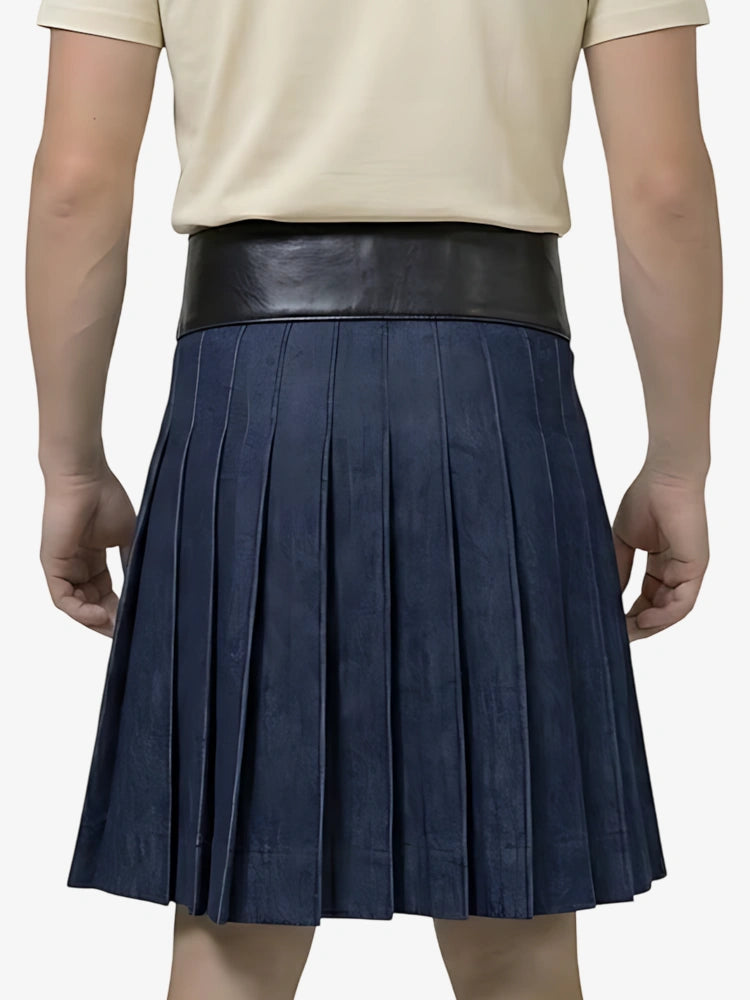 Person wearing a navy pleated skirt with a black waistband on a white background