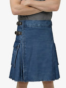 Blue denim kilt worn by a person on a white background