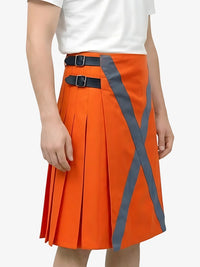 Orange pleated skirt with gray accents worn by a person on a white background