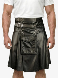 Black leather kilt with silver buckles worn by a person on a white background