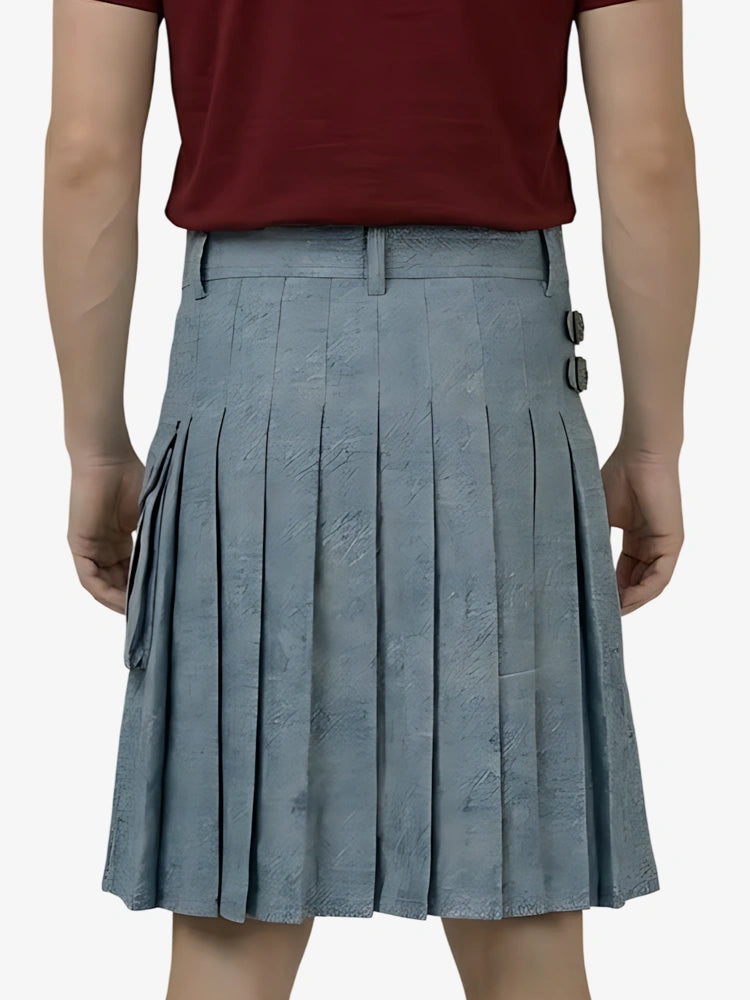 Person wearing a maroon top and gray pleated skirt on a white background