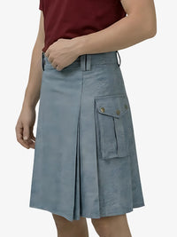 Blue cargo skirt worn by a person on a white background