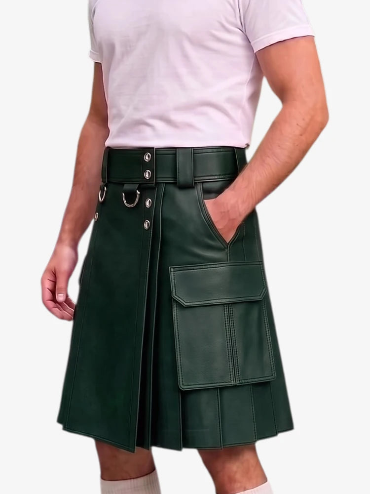 A dark green faux-leather kilt with a matching belt, silver-tone hardware, and a large front cargo pocket, shown on a model wearing a light pink t-shirt against a white background.
