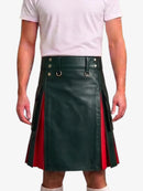 A dark green faux leather kilt with red side panels and gold-tone hardware, modeled with a light pink t-shirt against a plain white background.