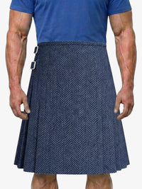 Person wearing a blue kilt on a white background