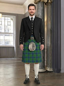 Man wearing a traditional Scottish kilt in an elegant interior setting