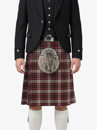 Person wearing a black jacket, vest, and red plaid kilt with a silver sporran on a white background