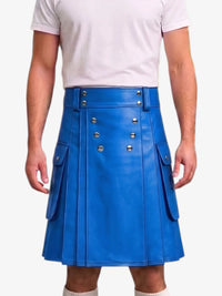 A bright blue faux-leather kilt skirt with silver-tone metal studs and flap pockets, shown on a model wearing a white t-shirt against a light gray background.