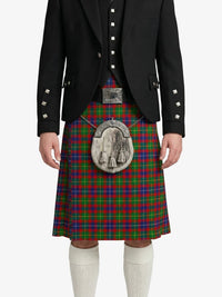 Person wearing a traditional Scottish kilt with a tartan pattern on a white background