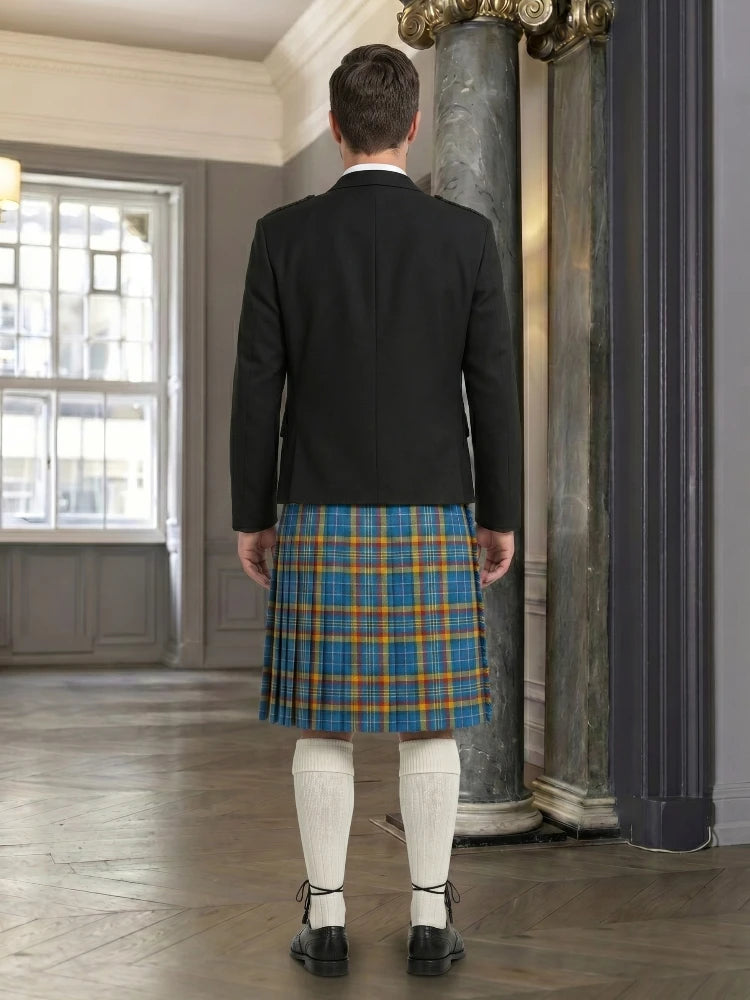 Person wearing a black jacket and blue plaid kilt in an indoor setting.