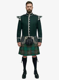 Man wearing a traditional Scottish irish national tartan kilt with a dark green jacket on a white background