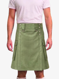 A person wearing a light pink t-shirt and a sage green faux-leather kilt with silver-tone hardware and side cargo pockets, shown against a plain light gray background.