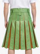 Light Green pleated skirt with brown accents worn by a person on a white background