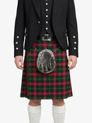 Person wearing a traditional Scottish kilt with a tartan pattern on a white background