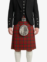 Person wearing a red tartan kilt with a black jacket on a white background