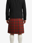Person wearing a black jacket and red plaid kilt on a white background