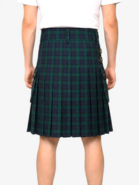 Green plaid kilt worn by a person on a white background