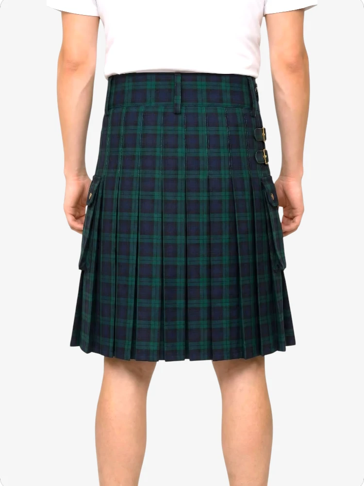 Green plaid kilt worn by a person on a white background