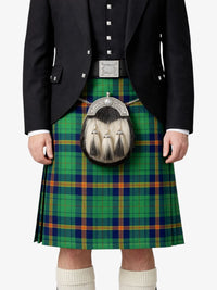 Person wearing a green plaid kilt with a sporran on a white background