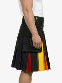 Black kilt with colorful accents held by a person on a white background