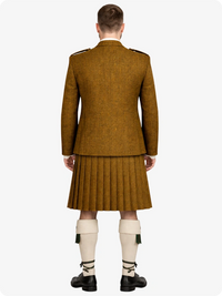 Person wearing a traditional Highland kilt outfit on a white background