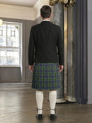 Man wearing a dark jacket and plaid kilt in an indoor setting.