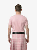 Person wearing a pink t-shirt and pink plaid kilt from the back on a white background