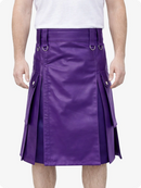 Purple kilt worn by a person on a white background