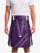 A person wearing a purple kilt with white geometric stripe details, paired with a white t-shirt and white socks, shown from the chest down against a light gray background.