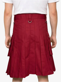 Red pleated skirt worn by a person on a white background