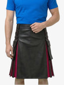 Person wearing a black and red kilt with a blue shirt on a white background
