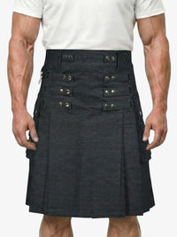 Black kilt with button details worn by a person on a white background