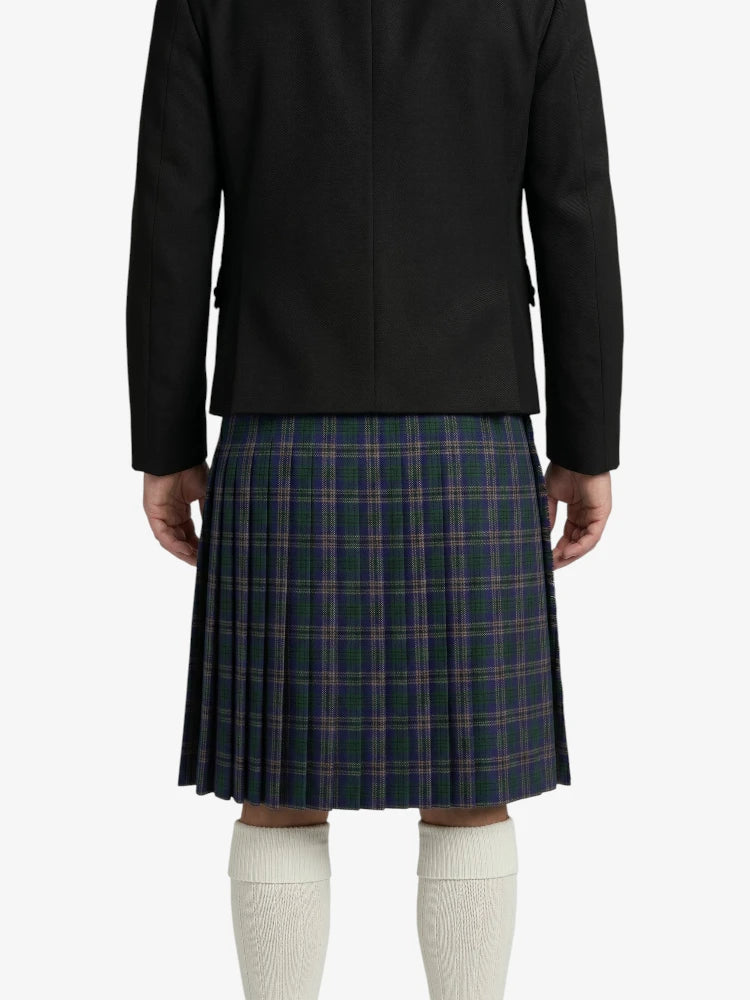 Person wearing a black jacket and plaid kilt on a white background