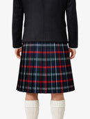 Person wearing a black jacket and plaid kilt  on a white background