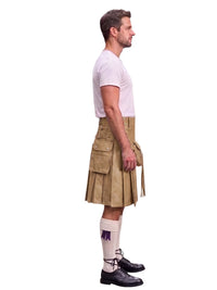 A man shown in profile wearing a tan leather kilt with multiple flap pockets, a white t-shirt, white knee-high socks, and black leather shoes, isolated on a white background.