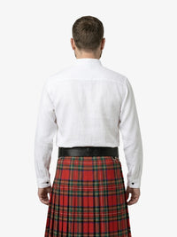 Man wearing a white shirt and red plaid kilt on a white background