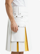 White skirt with yellow accents worn by a person on a white background
