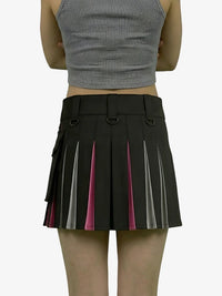 Black pleated skirt with pink accents worn by a person on a white background