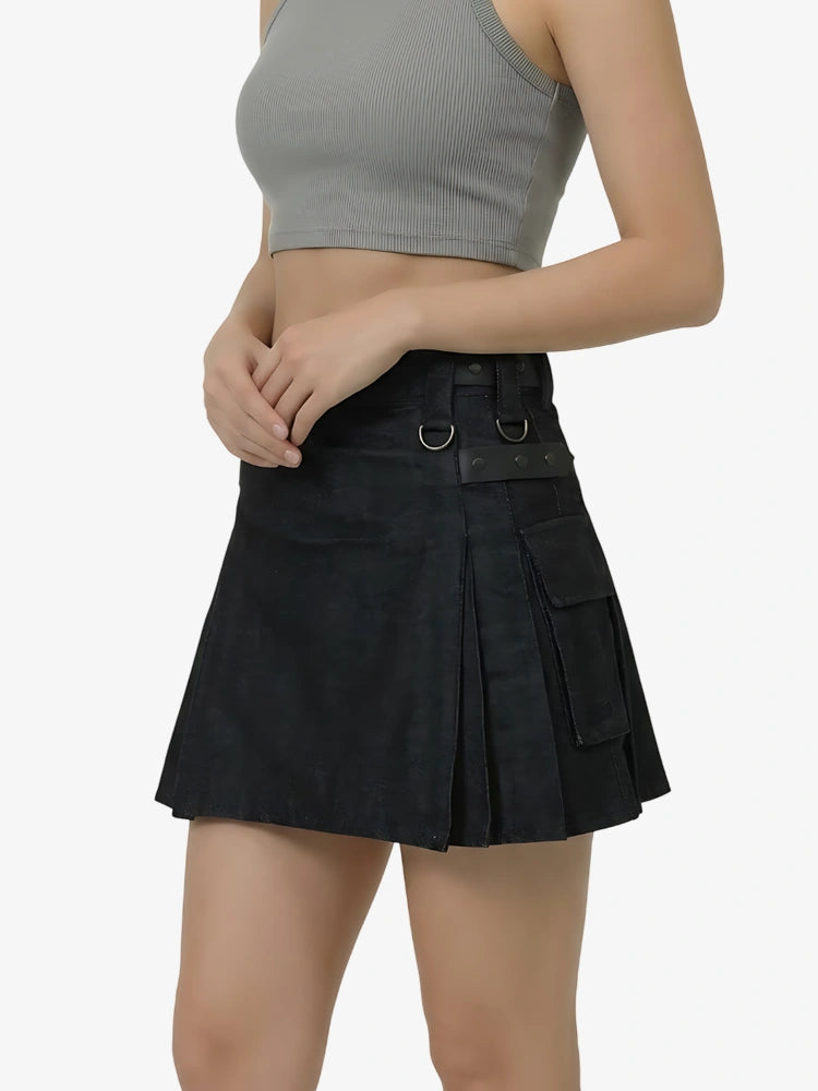 Black pleated skirt worn by a person on a white background