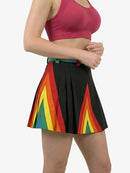 Person wearing a colorful skirt with rainbow design on a white background